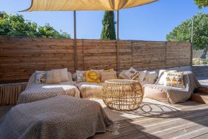 Maisons de vacances Superbe maison avec piscine en plein coeur du village : photos des chambres