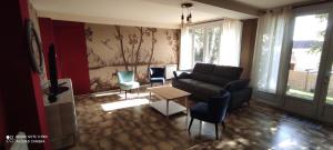 Maisons de vacances Maison avec jolie vue, 5mn a pied du centre : photos des chambres