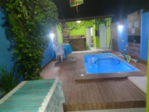 Casa com Ar e piscina no centro