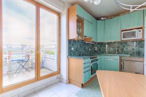 Trois pièces sur parc de la Villette Terrasse et vues