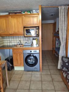 Appartements Studio pour 4 avec terrasse plein pied, coin montagne, vue montagne & nature a Praz sur Arly : photos des chambres