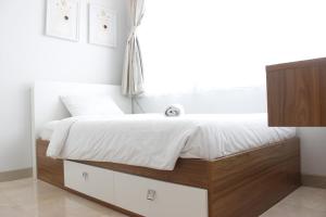 Elegant 2BR @ Dago Suites Apartment near ITB By Travelio