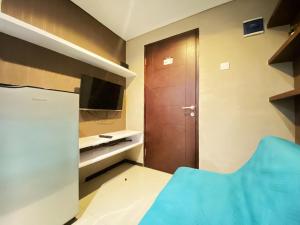 Minimalist 1BR Apartment at Gateway Pasteur By Travelio