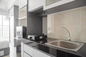 Cozy and Well Designed Studio Serpong Garden Apartment By Travelio