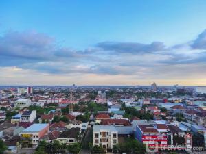 Nice and Cozy Studio at Vida View Makassar Apartment By Travelio