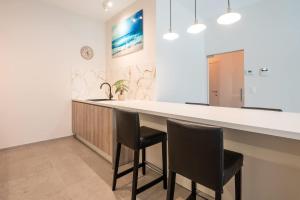 Brand new apartment with garden and parking