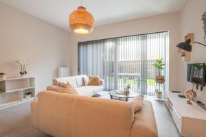 Brand new apartment with garden and parking