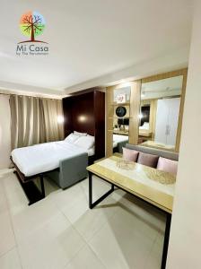 Mi Casa by The Persimmon