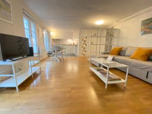 Appartements L'auberge des Halles- Epure & confortable : photos des chambres