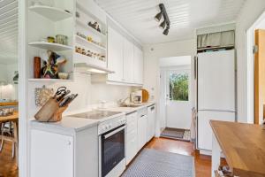 Cosy And Well-Kept Holiday Home With Covered Terrace, Large Garden And Child-Friendly Location Just 250 Metres From The Water And Close To Forest,