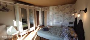 Maisons de vacances Maison avec jolie vue, 5mn a pied du centre : photos des chambres