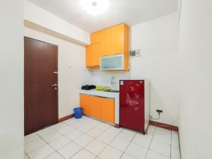 Minimalist 3BR Gateway Ahmad Yani Cicadas Apartment By Travelio