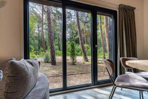 Luxe familiehuis in parkbos