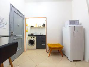 Studio na Praia de Copacabana, maquina de lavar