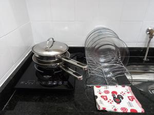 Studio na Praia de Copacabana, maquina de lavar