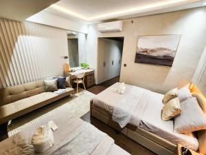 1 Bedroom Apartment in Aeon Towers I City Views I Free Wi-fi, Gym and Pool