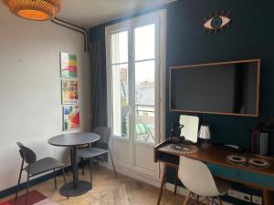 Studio vue Paris - Quartier Canal Saint-Martin