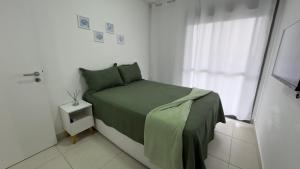 TULUM Bertioga - belo apartamento com vista para o mar