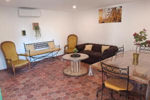 Maisons de vacances La maison d-Antoine a Robion : photos des chambres