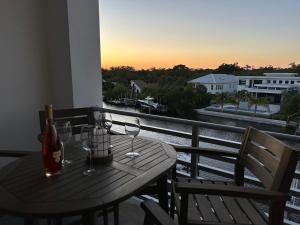 Luxury 2 Bed 2 Bath Waterfront Condo with Patio Sunsets Gym and Parking