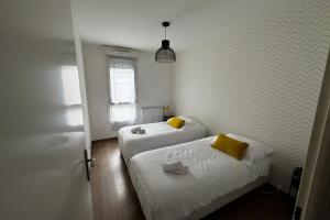 Appartements Le Piou Vert : photos des chambres
