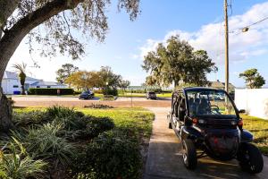 FunTropicalTinyHomeGolfCartLake