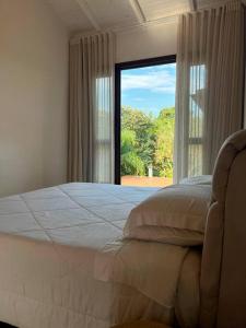 Casa hóspede privativa -Área piscina compartilhada