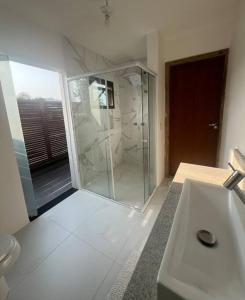 Casa hóspede privativa -Área piscina compartilhada