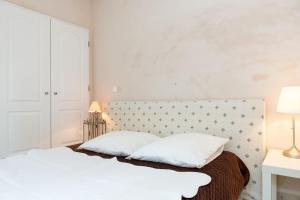 Appartements La petite maison des pins : photos des chambres