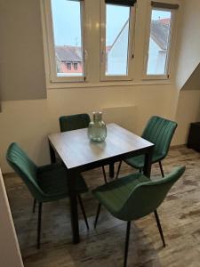 Appartements Le Cosy Green - centre-ville : photos des chambres