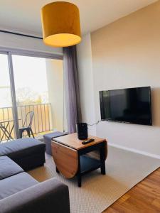 Appartements Cosy City : photos des chambres