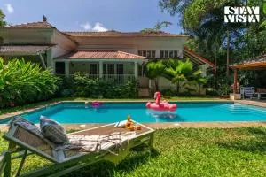 StayVista at A Portuguese Tale - Pool, Bar & BBQ - Verla