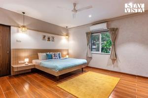 StayVista at Countryside Meadows with Pool, AC