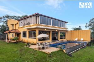 StayVista at Countryside Meadows with Pool, AC