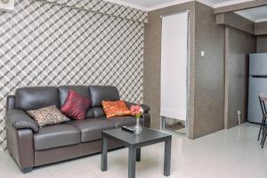 Spacious and Comfortable 2BR at Bassura City Apartment near Mall By Travelio