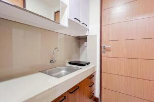 Scenic Studio Apartment at Vida View Makassar By Travelio