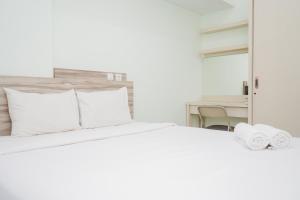 Comfortable 1BR at Casa de Parco Apartment By Travelio