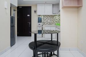 Comfortable 1BR at Casa de Parco Apartment By Travelio