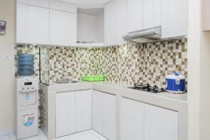 Comfortable 1BR at Casa de Parco Apartment By Travelio