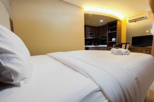 Minimalist Style Studio Brooklyn Alam Sutera Apartment near IKEA By Travelio