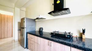 BluO Lake View 1BHK New Town - Terrace Garden, Gym