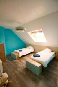 Maisons de vacances Evasion entre Mer et Campagne avec Babyfoot et terrain de petanque, 3 chambres, cheminee - Intendance Luxury Host : photos des chambres