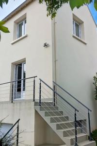 Maisons de vacances Petite maison avec jardin : photos des chambres