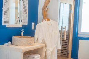 Appartements Les Secrets de la Baie - l-Archipel - cocon bien-etre avec Spa et Sauna : photos des chambres