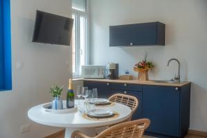Appartements Les Secrets de la Baie - l-Archipel - cocon bien-etre avec Spa et Sauna : photos des chambres