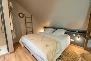 Appartements Les Secrets de la Baie - le Refuge - parenthese enchantee avec Spa privatif : photos des chambres