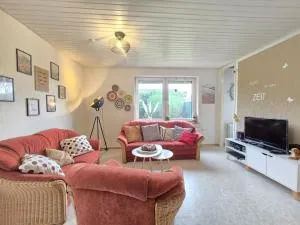 Ferienhaus Lüttje Uttiet mit eingezäunten Garten - Großheide