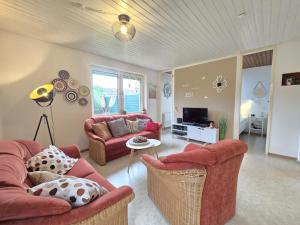 Ferienhaus Lüttje Uttiet mit eingezäunten Garten