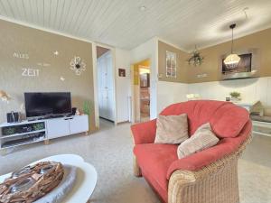 Ferienhaus Lüttje Uttiet mit eingezäunten Garten