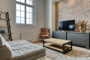 Appartements Jonathan Appartement avec place de parking : photos des chambres